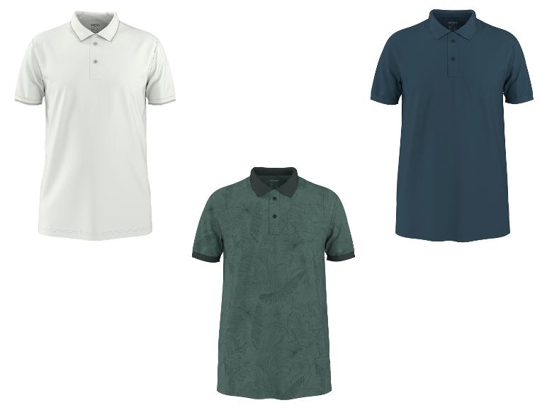 Trois polos: blanc, vert à motifs de feuilles et bleu foncé.
