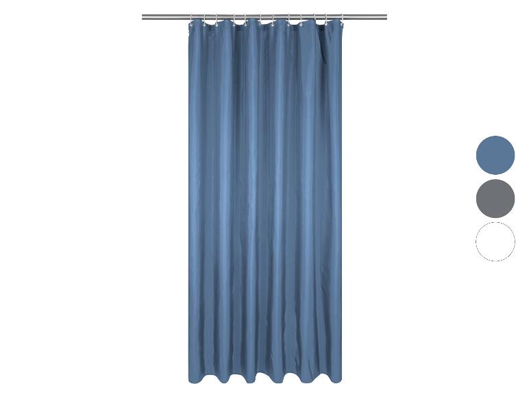 Rideau de douche bleu avec barre en métal.