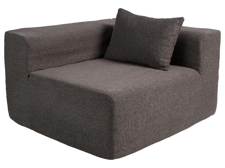 Canapé d'angle modulaire gris foncé avec coussin décoratif assorti.