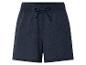 Shorts en tissu texturé, coupe ample, cordon de serrage à la taille.