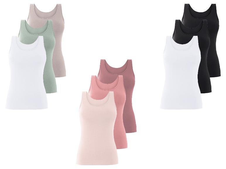 Des débardeurs pour femmes dans différentes couleurs, dont du blanc, du noir et du rose.