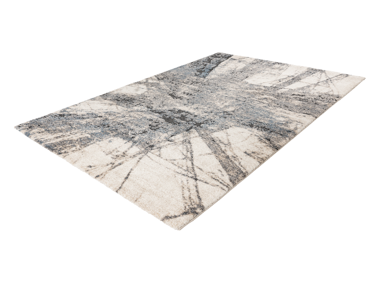 Tapis moderne au design abstrait dans des tons beige et gris.