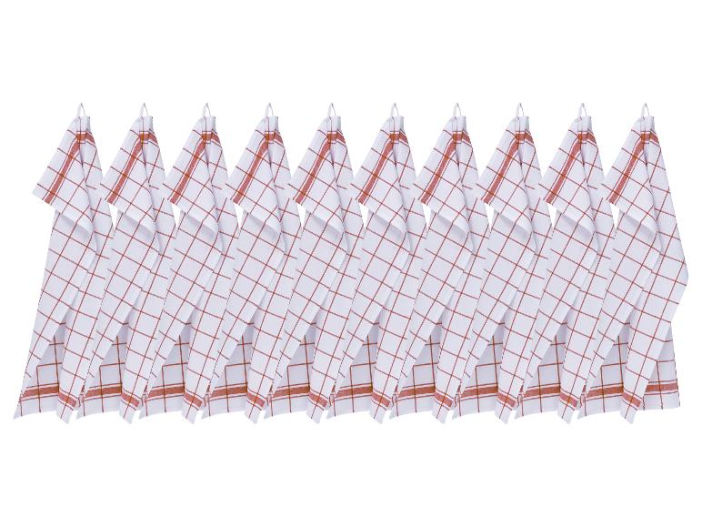 Rangée de torchons de cuisine à carreaux blancs et rouges suspendus