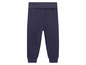 Pantalon de survêtement bleu foncé avec une ceinture élastique.