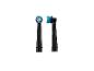Deux têtes de brosse à dents électrique noires avec des poils bleus et verts.