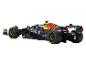 Une voiture de course de Formule 1 Red Bull noire et jaune avec le parrainage d'Oracle.