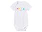 Combinaison blanche pour bébé avec l'inscription 'SMILE everyday'