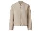 Blouson bomber beige à fermeture éclair.