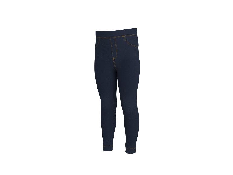 Legging enfant bleu foncé avec surpiqûres jaunes.
