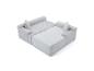 Canapé modulaire en velours côtelé gris clair avec coussins, sur fond blanc.