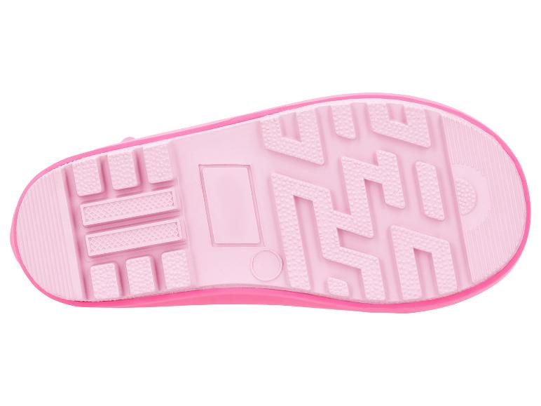 Semelle de botte de pluie rose pour enfant avec motif de bande de roulement texturé.