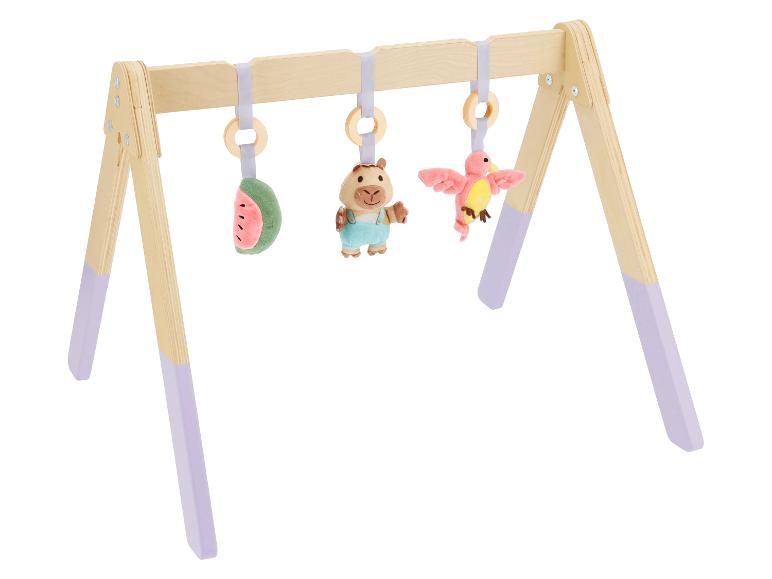 Portique d'éveil en bois pour bébé avec jouets suspendus pastèque, hippopotame et oiseau.