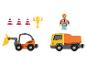 Ensemble de jouets de construction avec une pelleteuse, un camion à benne basculante, une figurine de travailleur et d'autres accessoires.