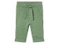 Pantalon vert à cordon pour bébés.