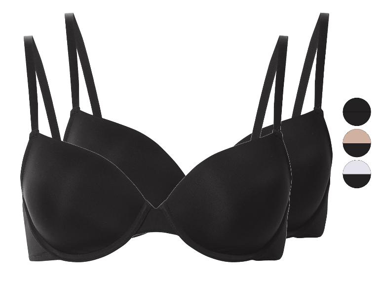 Ensemble de deux soutiens-gorge noirs avec des échantillons de couleurs en noir, beige et blanc