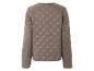 Une veste matelassée beige clair avec des manches longues.