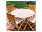 Ensemble table et chaises en teck pour extérieur.