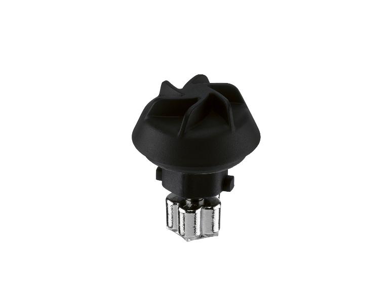 Un bouton noir en forme d'étoile avec une fixation argentée.