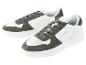 Des baskets blanches et vertes de U.S. Polo Assn.