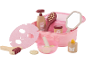 Kit spa jouet avec sac rose, masque facial, brosse, miroir et crèmes.