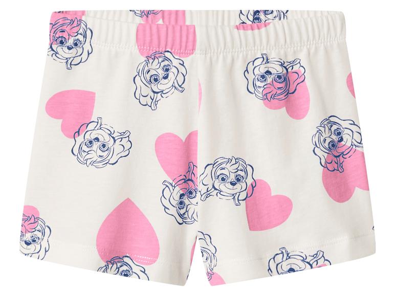 Short blanc avec cœurs roses et visages de chiens de dessin animé