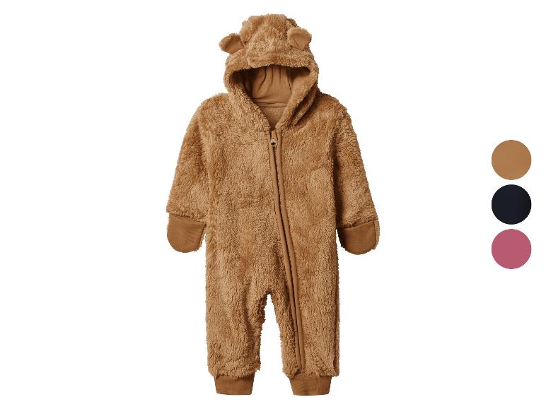 Combinaison bébé marron en peluche avec capuche à oreilles d'ours et fermeture éclair.