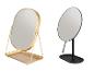 Deux miroirs de table : un miroir ovale doré avec un plateau et un miroir rond noir.