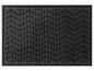 Un paillasson noir avec un motif en zigzag.