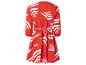 Une robe rouge à imprimé blanc, à manches longues.