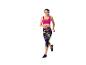 Femme courant en soutien-gorge de sport rose et leggings colorés.