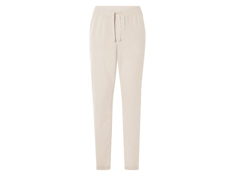 Pantalon beige clair, coupe décontractée.