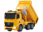Camion-benne jouet jaune avec benne levée et phares allumés.