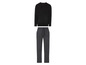 Un pyjama noir à manches longues avec un pantalon à motif géométrique.