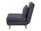 Fauteuil convertible gris foncé avec accoudoir et coussin.
