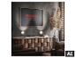 Cadre avec texte 'Light. Inspired by life.' sur mur sombre, avec buffet en bois et plantes.