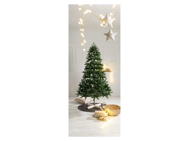 Sapin de Noël artificiel avec lumières et décorations d'étoiles.