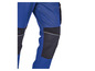 Pantalon de travail bleu avec genouillères noires.