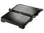 Un grill noir avec des plaques cannelées.