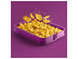 Des tranches de pommes de terre grillées dans un moule Coox violet.