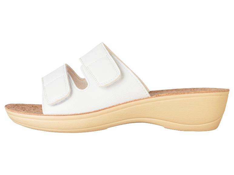 Sandales blanches à plateforme, brides velcro.
