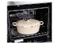 Cocotte en fonte beige SilverCrest dans un four noir
