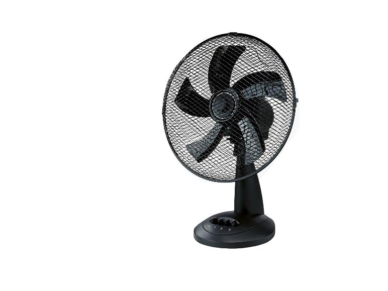 Ventilateur de table noir avec grille de protection et boutons de contrôle de vitesse