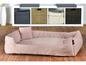 Un lit pour chien rose de la marque 'Robeco Scheider'.