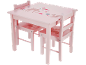 Table et deux chaises pour enfants en bois rose avec illustrations d'animaux de la forêt.