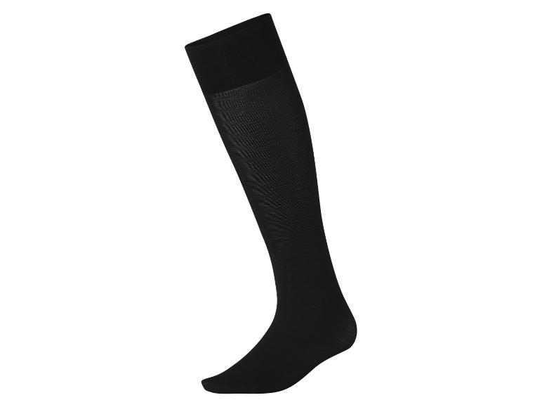 Une chaussette noire montante avec un revers côtelé.