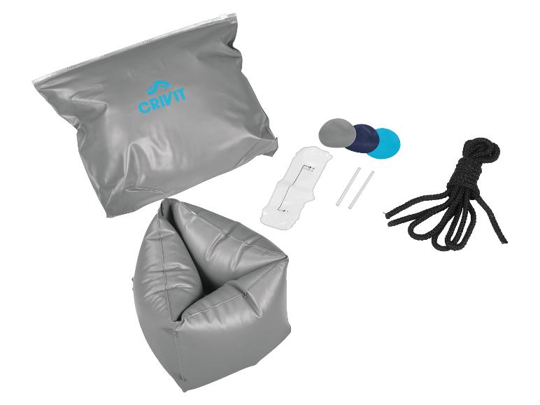 Matelas gonflable Crivit et accessoires : matelas gris, pompe, kit de réparation et corde.