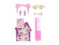 Accessoires de spa roses pour enfants, dont un bandeau, des masques faciaux, un peigne et des soins.