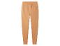 Pantalon de survêtement beige avec une taille élastique.