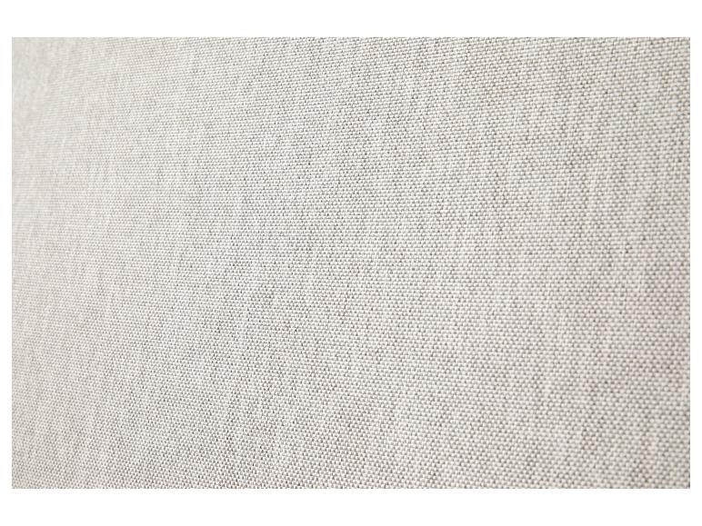 Détail de tissu gris clair avec texture visible