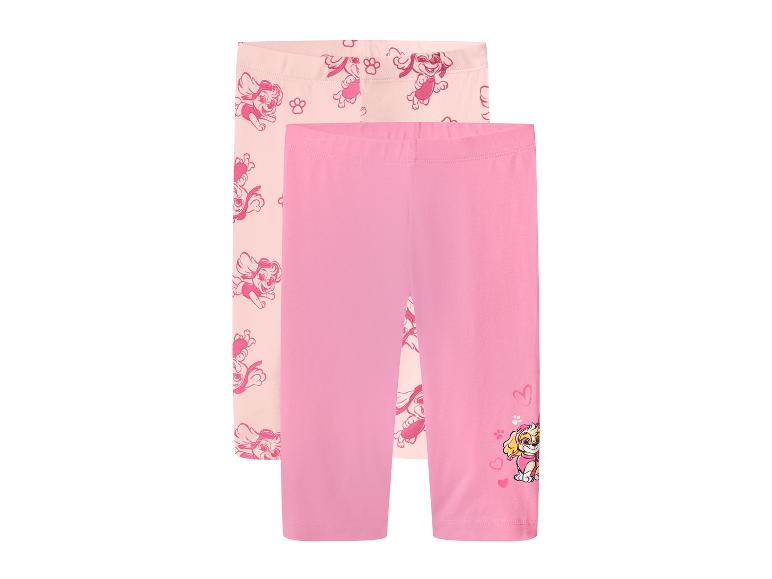 Deux leggings capri roses pour filles avec des imprimés de chiots de dessins animés.